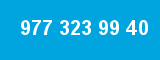 977 323 99 40